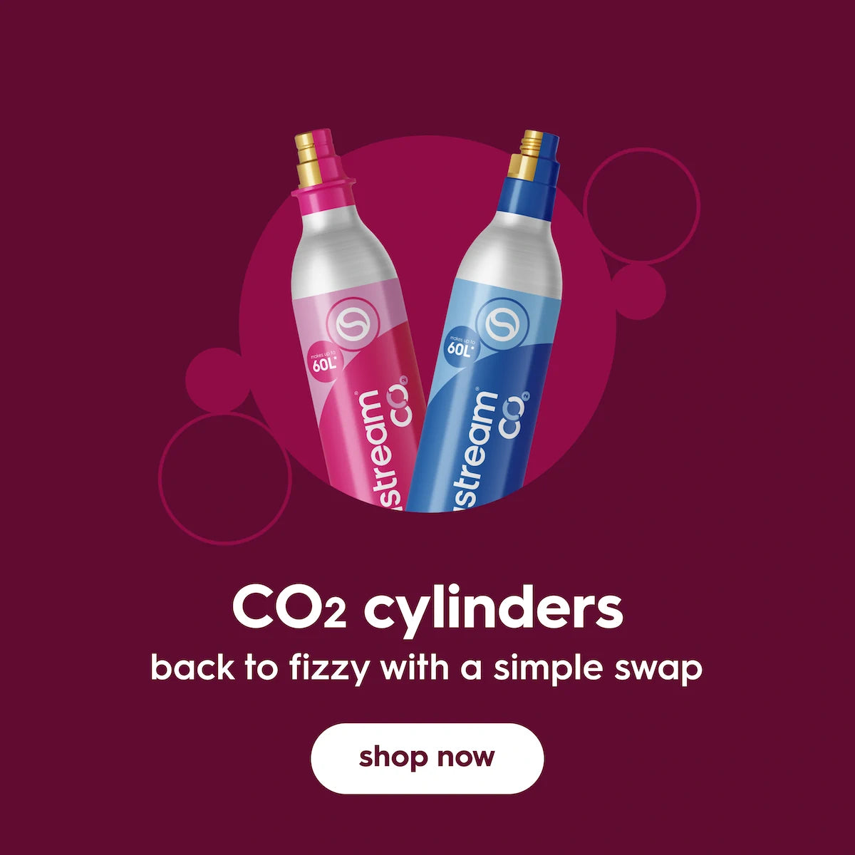 Pink and blue Sodastream CO2 cylinders with the text “CO2 cylinders – back to fizzy with a simple swap” and a Shop now button