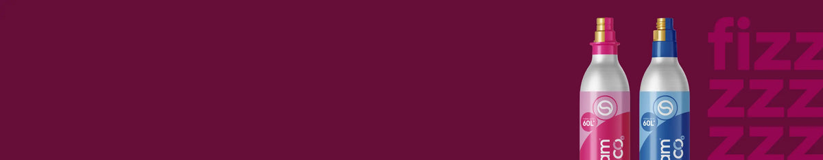 Pink and blue Sodastream CO2 cylinders on a maroon background