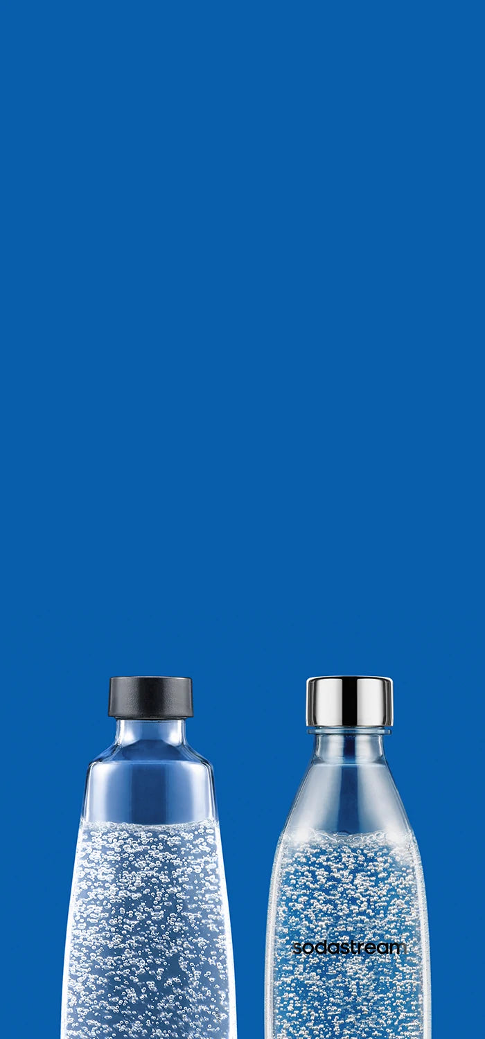 Two Sodastream carbonating bottles on a blue background