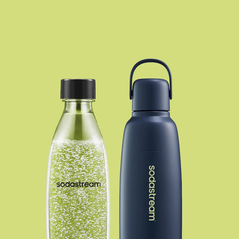 Sodastream carbonating bottle of sparkling water next to a navy Fizz & Go bottle on a lime green background