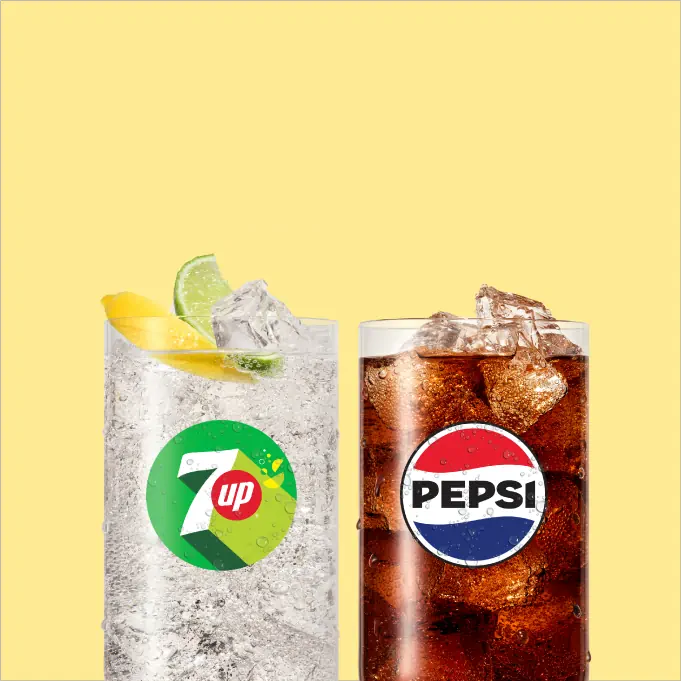 Glasses of 7UP and Pepsi made with Sodastream flavours, served over ice