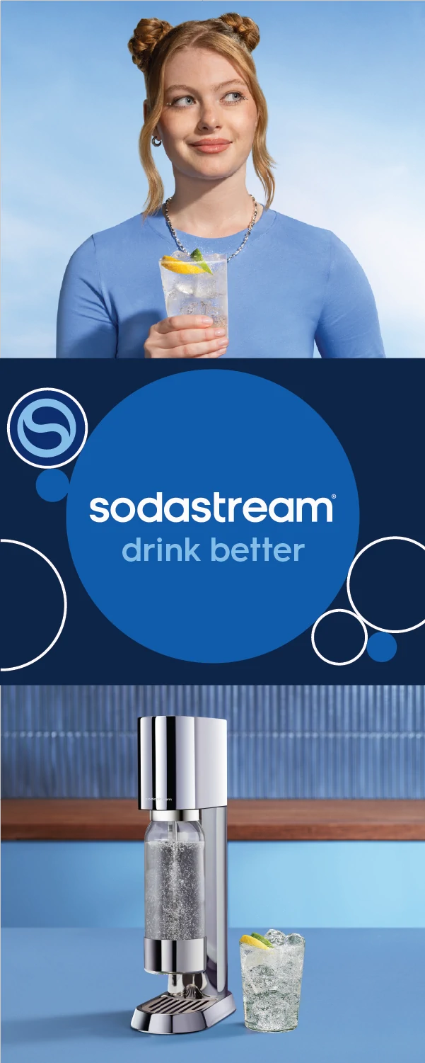 Person holding a glass of sparkling water beside a Sodastream sparkling water maker, with the text “Sodastream drink better”