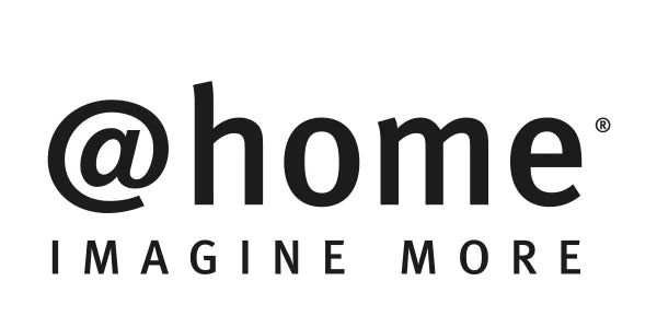 Logo of @home with tagline 'Imagine More' on a white background